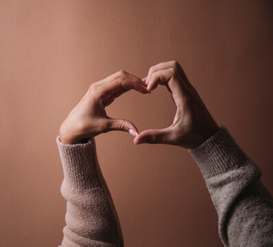 Love romance background concept. Hand heart shape