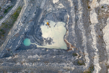 Pumping water from a quarry, flooding a quarry, view from above