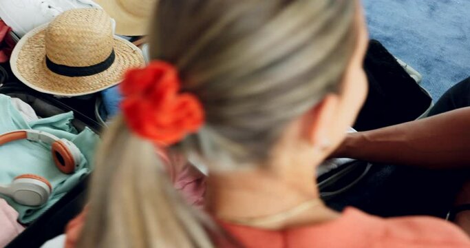Couple, laptop or planning travel suitcase for holiday, vacation or getaway location in bedroom of home packing. Marketing, advertising or man and woman with internet research on tourist destination
