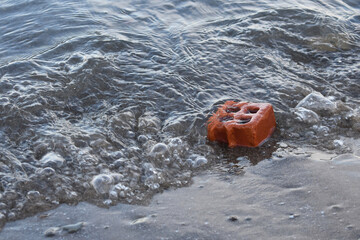 Brick Being Covered by Water