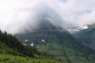 snow mountains in the clouds