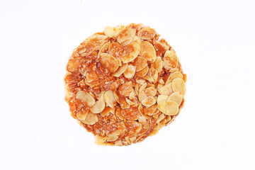 Almond florentine cookies on white background   
