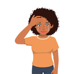 Young African woman feeling sad, crying, broken heart, upset, tired and bored with hand on her forehead
