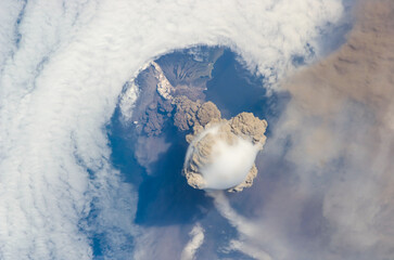 Sarychev Volcano eruption aerial view from above in Russia. Digitally enhanced. Image courtesy of...