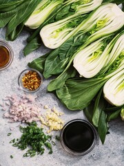 Vertical top view of Bok choy with other vegetables on grungy background