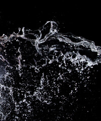 Shape form droplet of Water splashes into drop water attack fluttering in air and stop motion freeze shot. Splash Water for texture graphic resource elements, black background isolated
