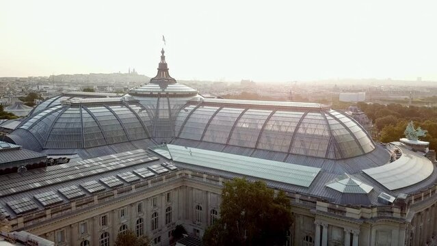 Drone tour of Grand palais from above, a brigth summer day in Paris city Panorma