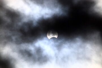 Solar eclipse - The Moon partially blocks the Sun from an observer on Earth.