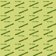 Pattern with the Inscription Vegan food 100% fresh on a light green background.