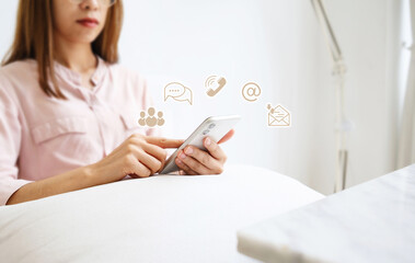 Business woman hand holding a modern smartphone contact customer online messaging, email, address. ...