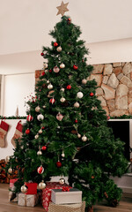 Christmas, tree with gifts and decorations for festive season celebration event in living room for magic holiday tradition. Xmas presents, Christmas tree ornaments and December winter vacation home