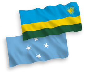 National vector fabric wave flags of Republic of Rwanda and Federated States of Micronesia isolated on white background. 1 to 2 proportion.