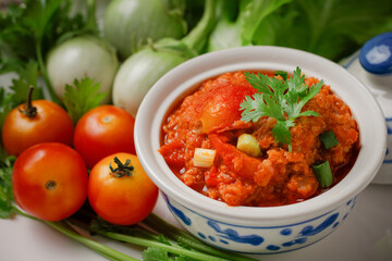 Thai food, Nam Prik Ong, a northern food made from minced pork stir-fried with tomatoes and chili. Spicy Chili Paste Lanna style food.