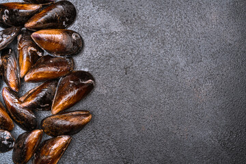 Raw mussels on the vintage background