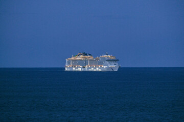 MSC cruiseship or cruise ship liner Grandiosa in Marseille Provence port during sunrise twilight blue hour Mediterranean cruise dream vacation