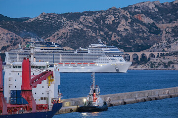 MSC cruiseship or cruise ship liner Grandiosa in Marseille Provence port during sunrise twilight...
