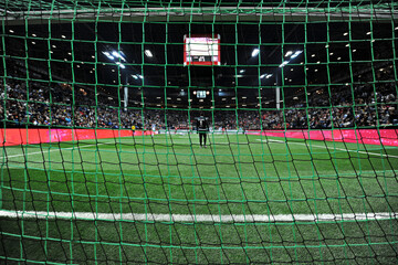 Full frame shot of soccer net in stadium