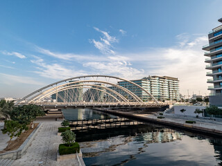 Fototapeta na wymiar Apartment buildings of the Al Bandar neighbourhood in Al Raha Beach community, Abu Dhabi
