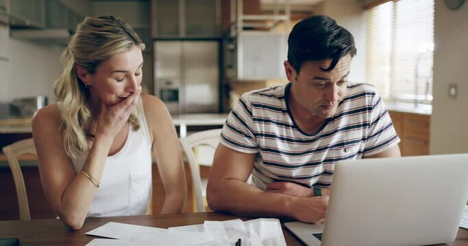 Sad, stress and couple on laptop with financial trouble, money problem or bills. Anxiety, worry and broke, frustrated and bankrupt man and woman in home with taxes, expenses or loans and debts to pay
