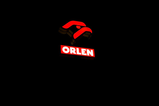 Poznan, Poland, November 2022: Sign of polish petrol company Orlen at night.
