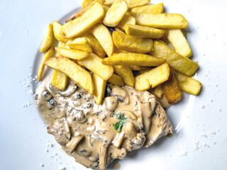 Juicy steak, beef meat with tomato and french fries