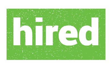 hired text written on green stamp sign.