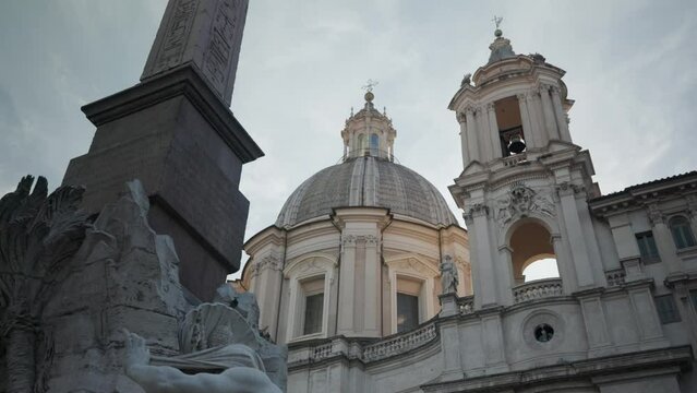 Sant'Agnese in Agone Church And Egyptian Obelisk In Rome, Italy - low angle 