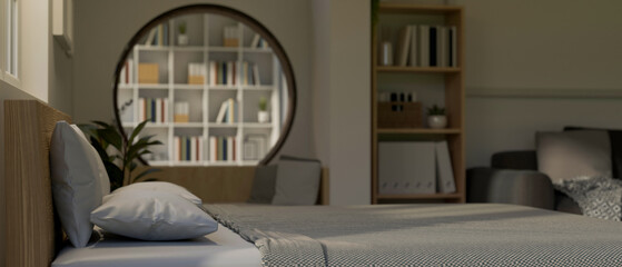 Comfortable and minimalist bedroom with comfy bed, shelves, sofa, home decor and circle wall.