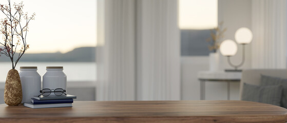 close-up, Wood tabletop with copy space against blurred modern cozy living room in background - obrazy, fototapety, plakaty
