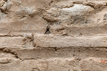 The surface of the sandy rock. Durable building material and archaeological site. Background. Space for text.