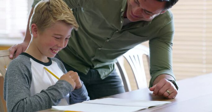 Father, kid with homework and help with math home education for child development, learning motivation and writing pencil in notebook. Happy, proud dad teaching and homeschool studying in family home