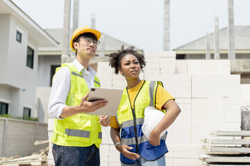 Architect or engineer working in office with blueprints On-site engineer inspection for architectural plans Construction project sketch. Focus on selection. Business construction concept.