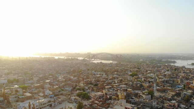 Aerial shot of Rohri city of Sindh during the sunset time. 