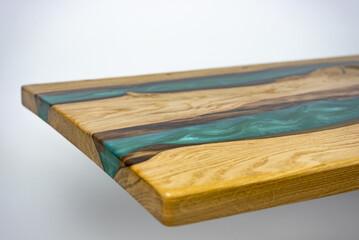 Coffee table, living room table. Resin handmade wood table. White background.