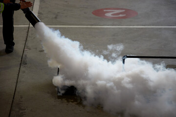 Cropped view of people in fire extinguishing approach training
