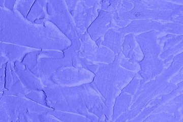 concrete blue violet color trend 2022 background with beads of plaster