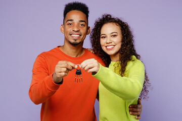 Young couple two friend family man woman of African American ethnicity wear casual clothes together...