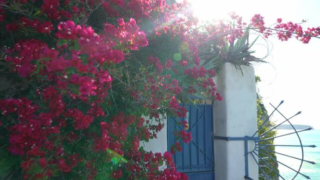 A Doors Leading to small church perched on the rocks of Arvanitia Promenade in Nafplio