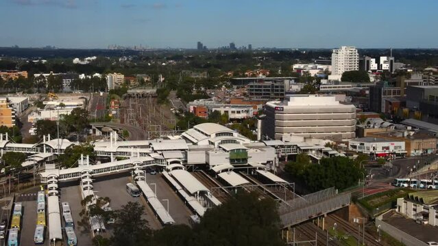 Train station and bus terminal in suburb Blacktown New South Wales with cityscape