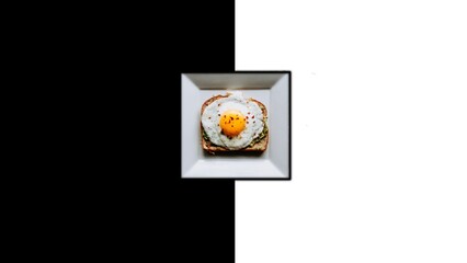 Egg half fry and bread in square plate with black and white background ,food breakfast, 