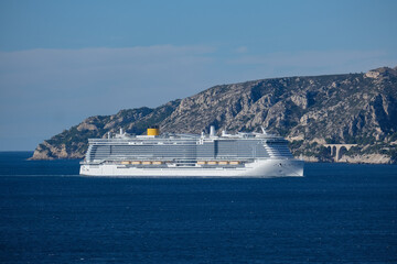 Costa cruiseship or cruise ship liner Toscana in Marseille Provence port during sunrise twilight...
