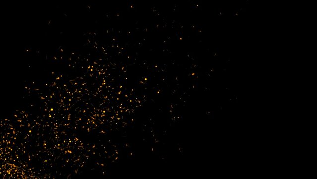 Particles of fire sparks rising through the screen on black background. Fire flame particles flying over black screen background