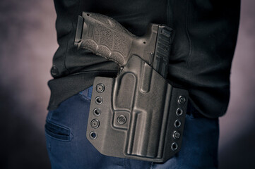 Handgun in the holster
