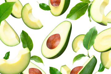 Falling and flying fresh avocado and green leaves with pit isolated on white background. Ripe fresh green avocado levitation Clipping Path. Full Depth of field. Focus stacking