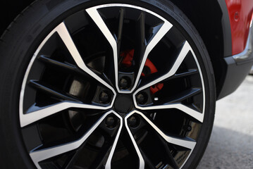 Alloy wheel with calipers and brakes of the car. Brake disc and low profile tyres. Car test...