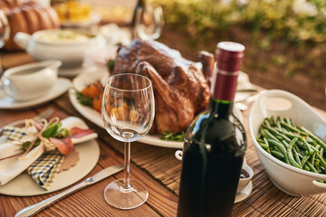 Top view, wine glass and food at luxury restaurant, chicken and vegetable. Alcohol, meal, fresh meat and arranged for lunch on a vineyard with wine tasting on a farm during a weekend or healthy lunch