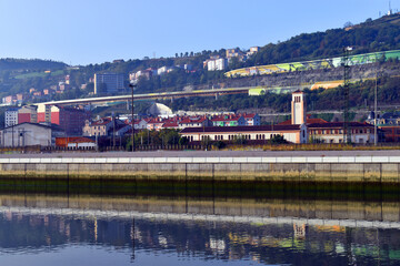 The Nervión estuary and the church of San Pablo Apóstol in the Ribrea de Deusto. Bilbao. Basque Country