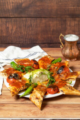 Wrapped Doner Kebab. Special kebab prepared with tomato and butter. local name beyti doner