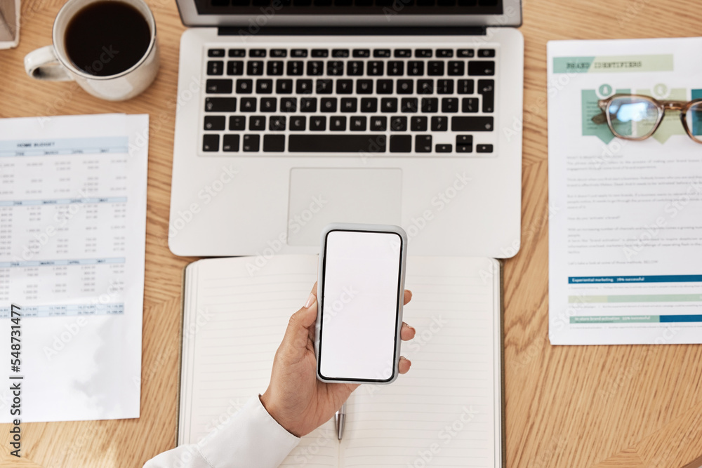 Poster laptop, paperwork and phone with mockup space at a desk in a modern office working on project. cup o