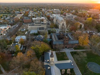 Drone view of golden sunrise over Princeton New Jersey. Cityscape with famous landmarks